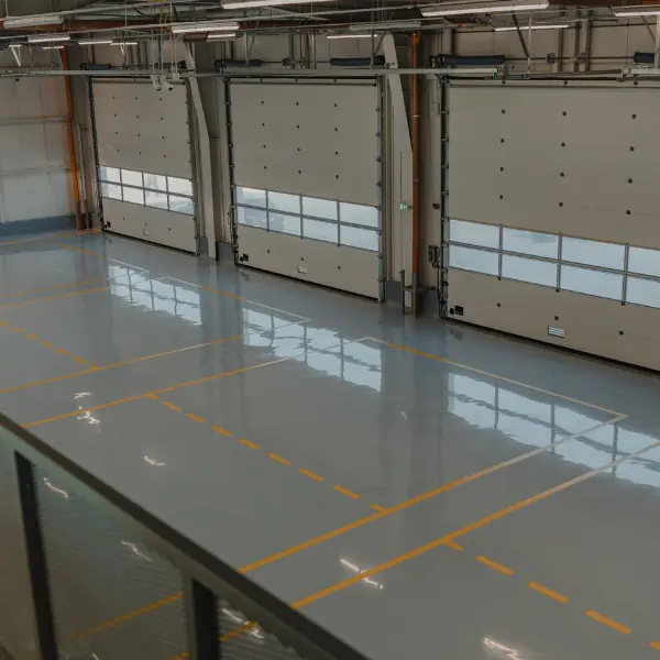 Concrete surface finished with a polyurethane coating