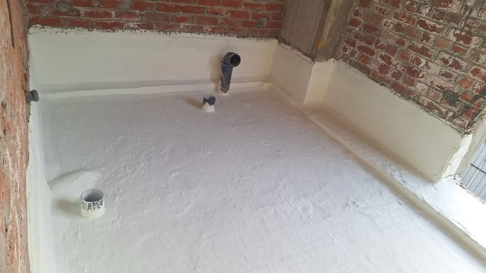 Bathroom floor and walls waterproofed by PCES before tiling