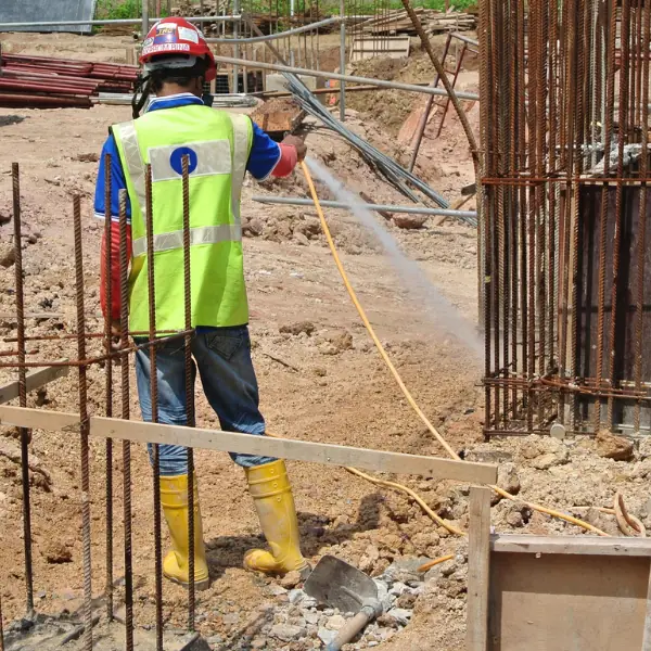 Pre-construction anti-termite chemical being sprayed at a construction site